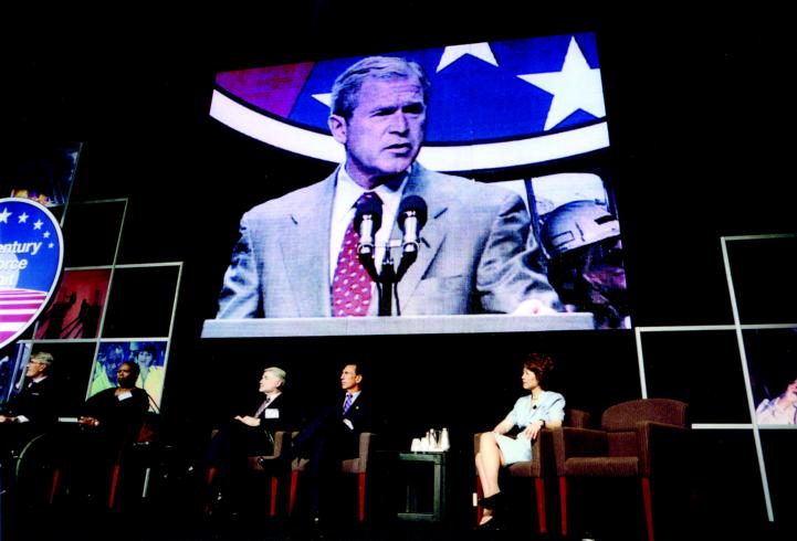 Photo of President George W. Bush giving a speech at the 21st Century Workforce Summit.