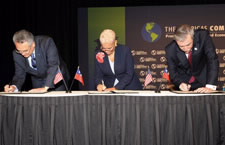 Gutierrez, Atlanta Mayor Shirley Franklin, and Chilean Minister of Economy, Development & Reconstruction Hugo Lavados Sign Agreement to Hand over the 2009 ACF to Chile. Click here for larger image.