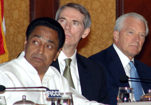 Minister Kamal Nath ,left,, U.S. Trade Representative ,center, Rob Portman and Ambassador David C. Mulford sharing the dais at a luncheon meeting organized by FICCI in New Delhi, November 12, 2005. 