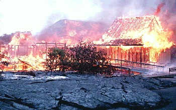 Waha`ula Visitor Center burns from lava flows moving beneath the building