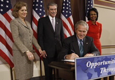 President Bush signing Andean Trade Prerence Extension with Schwab, Gutierrez and Rice looking on. Click here for larger image.