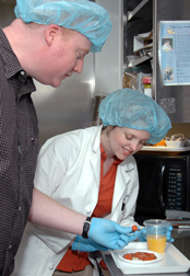 At the Children’s Nutrition Research Center, dieticians prepare high-calcium carrots for human consumption: Click here for full photo caption.