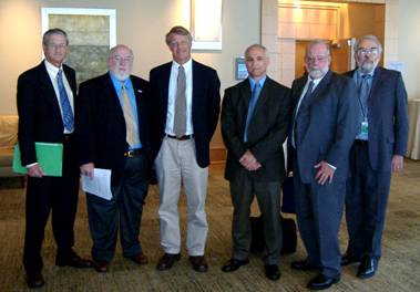 Photo of meeting attendees: Steve Higgins of the Broward County Environmental Protection Department, Mayor Harry Simmons of Caswell Beach, NC, Tony Pratt of the Delaware Department of Natural Resources and Environmental Control, Peppino Persio and Greg Malon of the U.S. Army Corps of Engineers, and John Fay of the U.S. Fish and Wildlife Service. 