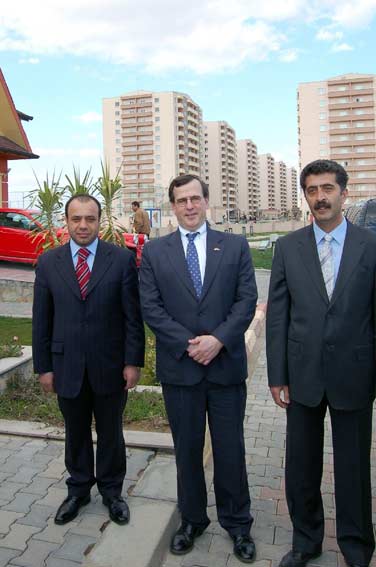In Erbil, Iraq, two managers of the Ankara-based Nursoy Group of Companies give Under Secretary Franklin L. Lavin an overview of the skyline-defining 