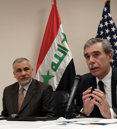 Secretary of Commerce Carlos M. Gutierrez (R) and Iraqi Minister of Trade Abd al-Falah al-Sudani (L) speak with the press after signing the Joint Statement on Commercial Cooperation on July 17 in Baghdad. (U.S. Department of Commerce photo) 