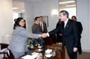 Secretary Gutierrez greets a Patent and Trademark worker