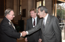 Secy Gutierrez shakes hands with Chamber Director