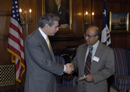 Secretary Gutierrez presents the 2005 Presidential Rank Award to Dr. Venkatachalam Ramaswamy, Senior Scientist, National Oceanic and Atmospheric Administration