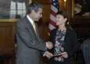 Secretary Gutierrez presents the 2005 Presidential Rank Award to Lynne G. Beresford, Dep. Commissioner for Trademark Examination Policy, U. S. Patent and Trademark Office