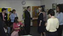 Secretary Gutierrez is greeted by a Commerce Department Adult Mentor at the Annandale, Virginia  Elementary School