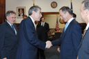 Secretary Gutierrez shakes hands with the Polish Embassador