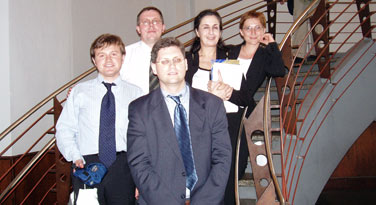 Three participants in the financial assets management training program with their Commerce Department and private-sector contacts during a visit to Washington, D.C. From left to right: Alexander Viner (JSCB TransCapitalBank); Maxim Bekishev, (BrokerCreditService); Michael Corbin (U.S. Department of Commerce); Lydia Borgatta, (senior vice president for investments, AG Edwards); Natalya Dostovalova (Vnesheconombank).