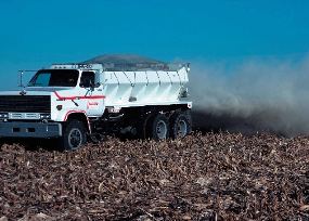 truck applying nutrients in field