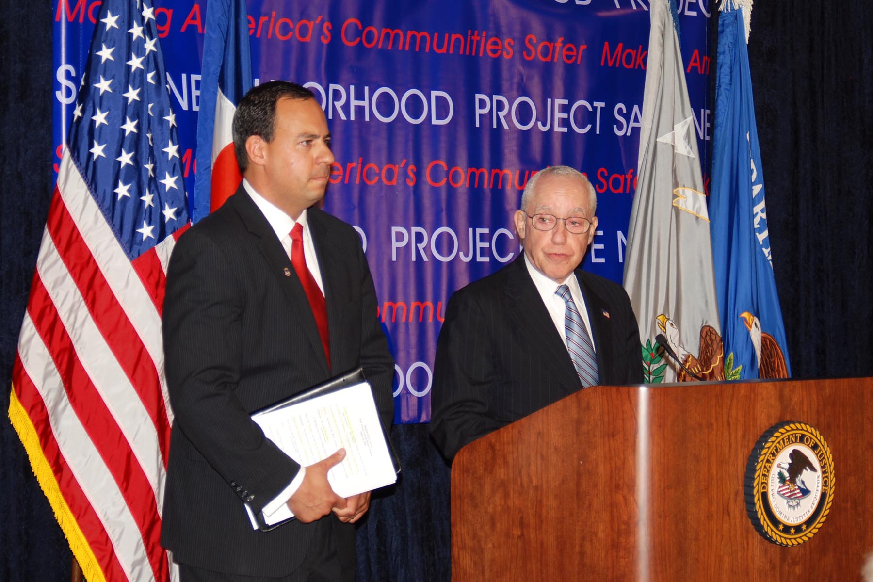 U.S. Attorney General Michael Mukasey and U.S. Attorney Troy Eid hold a news conference following the Metro Gang Task Force Briefing