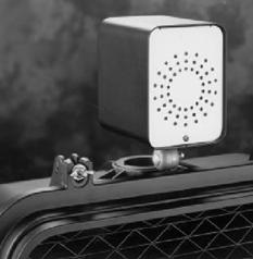 Photo of the US Traffic device mounted on top of a pedestrian signal head.