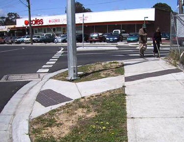 Figure 7. Australian use of bar tiles across sidewalk to indicate crossing location