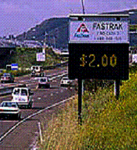 An image of a variable message sign informing motorists of the going rate prior to the entry point (FASTRAK $2.00)