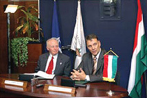 U.S. Ambassador George H. Walker III (left) and Minister of Defense Ferenc Juhász  take questions from the media during the ceremony to mark the agreement between Hungary and the U.S. to destroy MANPADS. [U.S. Embassy–Budapest]