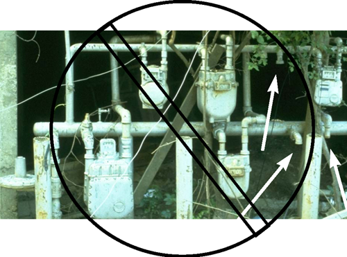 an example of service meters that were removed but the shutoff valve of each was not locked, and the pipes were not plugged.