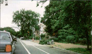 photo: East Capitol Street, Washington, DC, showing from left to right: travel lane, bike lane, parking lane