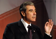 Secretary Gutierrez gesturing during a speech.