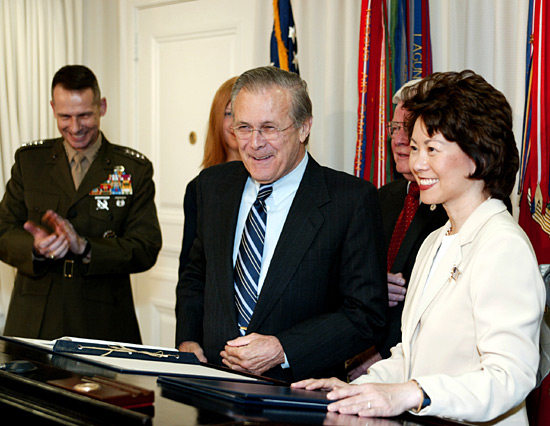 Defense Secretary Donald Rumsfeld and Secretary Chao