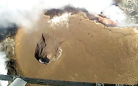 Aerial view of Puka Nui crater on south side of Pu`u `O`o vent, Kilauea Volcano, Hawai`i