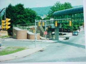 Pedestrian overpass with a switchback ramp (photo)