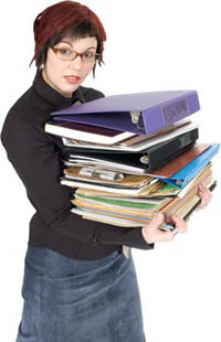 Lady with a pile of books representing services