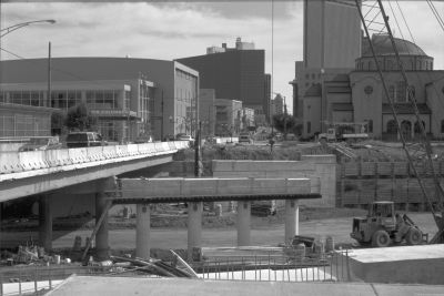 Figure 11 shows a section of I-670 under full closure. Construction equipment has full access to the roadway.  A bridge crossing I-670 carries normal traffic.