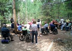 Photo of Board members and staff at picnic area in Rocky Mountain National Park