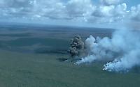 Dark explosion cloud rises from a methane explosion, Mauna Loa Volcano