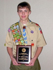 At one of Patuxent's Centerwide meetings, Matt was given a plaque from the U. S. Geological Survey thanking him for his outstanding contribution. The project earned Matt his Eagle Scout award.  Photo by Ed Grimes and the Horton family