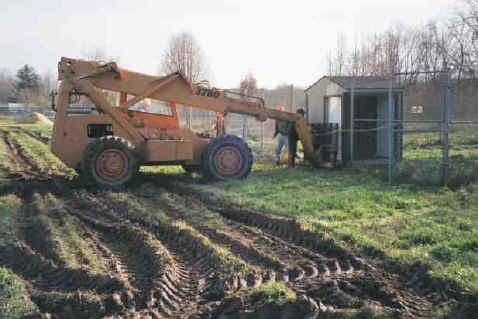 The Fish & Wildlife Service generously loaned us the heavy equipment we needed to move the sheds into place, and the staff to operate it.  Photo by Charles Robinson