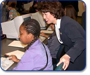 Secretary Elaine L. Chao views Gem Set training.  © 2002 Joan Hackett.  All rights reserved.