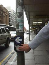 Pushbutton mounted on a pole in Australia.