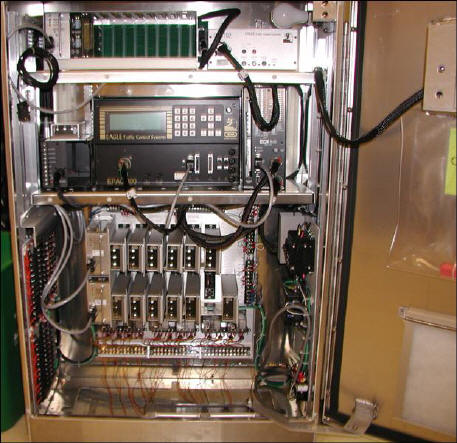 Typical TS 2 Type 1 Controller Cabinet and Components.  The Picture Shows The Location of the Controller Unit, Detectors, Conflict Monitor, Load Switches, Flasher, and BIU.