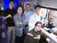 A team of researchers at the Georgia Institute of Technology has developed a new technique for creating films of nanoparticles in a polymer matrix. Shown are Peter Hotchkiss, Joe Perry, Seth Marder, Philseok Kim and Simon Jones -- who is holding a capacitor array device made with barium titanate nanocomposite