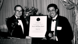  Photo of Gang Tian, 1994 Waterman award winner, with NSF Director Neal Lane