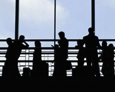 People standing in an airport terminal