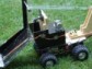 Four examples of students' robots, built on remote control truck platforms.