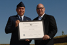 USCIS Director Emilio T. González recognizes Captain Van Thai as an "Outstanding American by Choice" in Baltimore, MD, Sept. 24, 2007