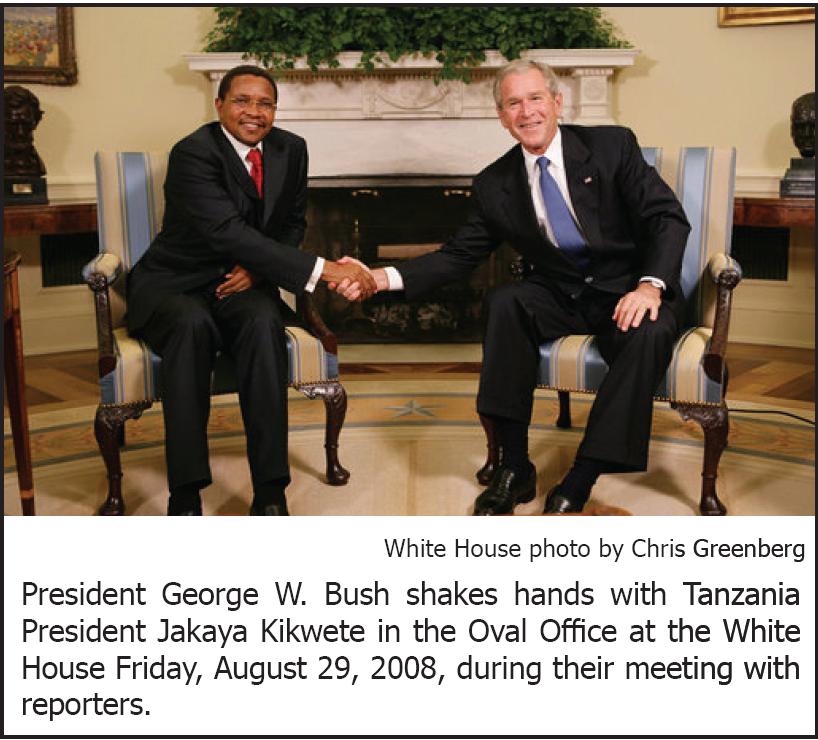 President George W. Bush shakes hands with Tanzania President Jakaya Kikwete in the Oval Office at the White House Friday, August 29, 2008, during their meeting with reporters.