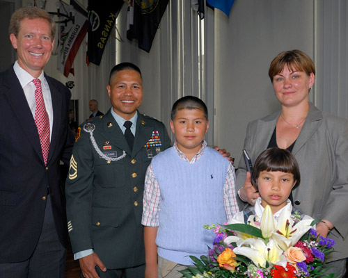 Acting Director Scharfen with the Chouchan Family