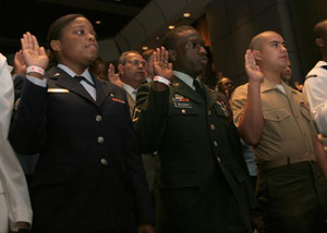 U.S. soldiers took the Oath of Allegiance during the U.S.S. Intrepid Naturalization Ceremony.