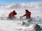 Photo of John Goodge and a colleague collecting specimens in the Transantarctic Mountains.
