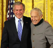 President Bush embraces Andrew Wyeth.