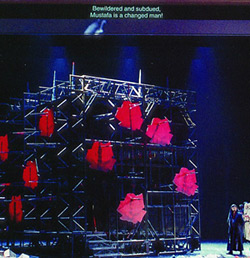 large stage shot with supertitle at the top