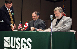USGS Director Mark Myers signs a MOU with Environment Canada.