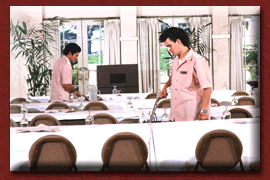 Service workers in banquet room